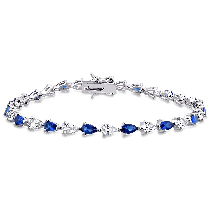The Perfect Accessory For Less – Jewelry Sale Live 10 1/2 CT TGW Pear Shape Created Blue and White Sapphire Tennis Bracelet in Sterling Silver