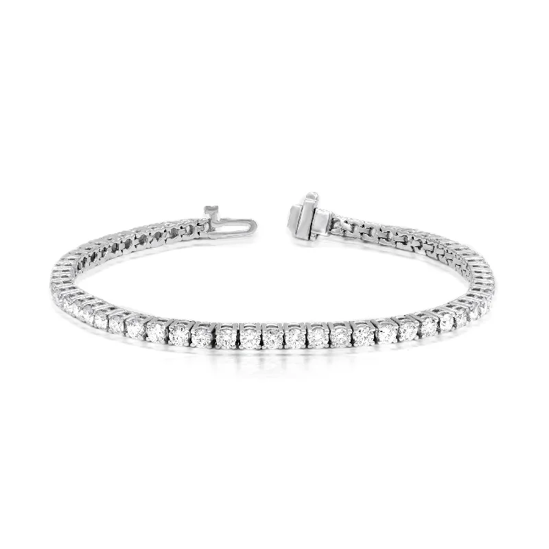 Elegant Jewelry, Exclusive Prices – Shop Now Diana M. 1.90 Carat Round and Baguette Diamond Bracelet