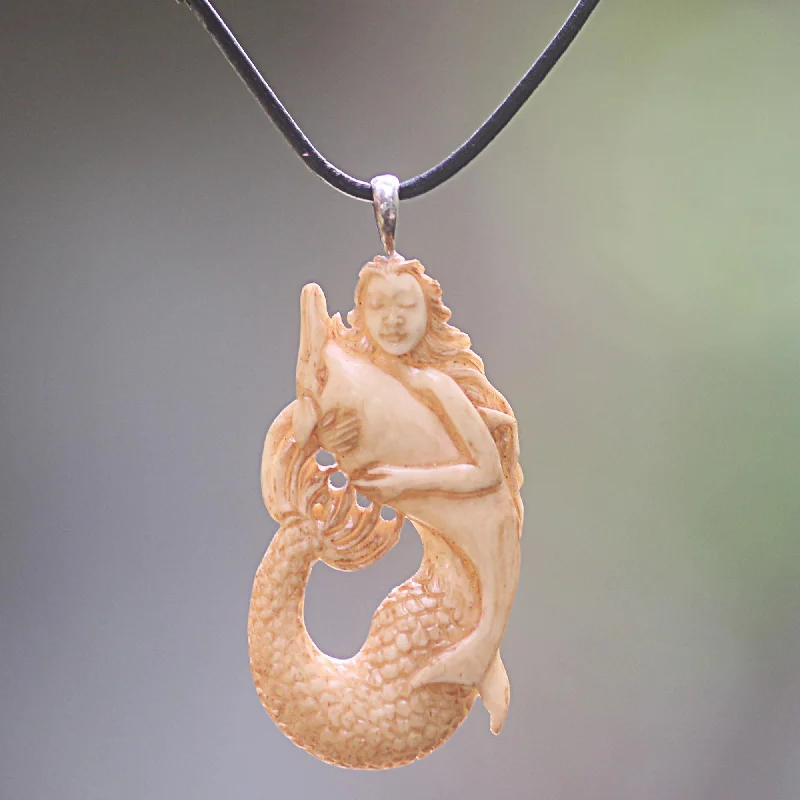 The Perfect Jewelry Piece At The Perfect Discount Mermaid & Dolphin Hand-Carved Pendant Necklace