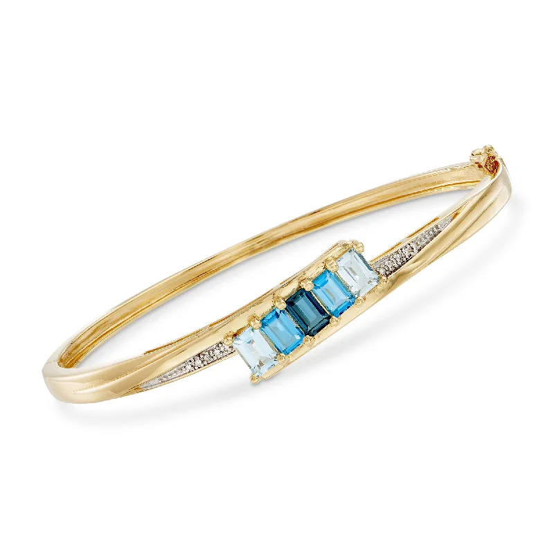 Stunning Jewelry At A Fraction Of The Price Ross-Simons Tonal Blue Topaz Bangle Bracelet With Diamond Accents in 18kt Gold Over Sterling